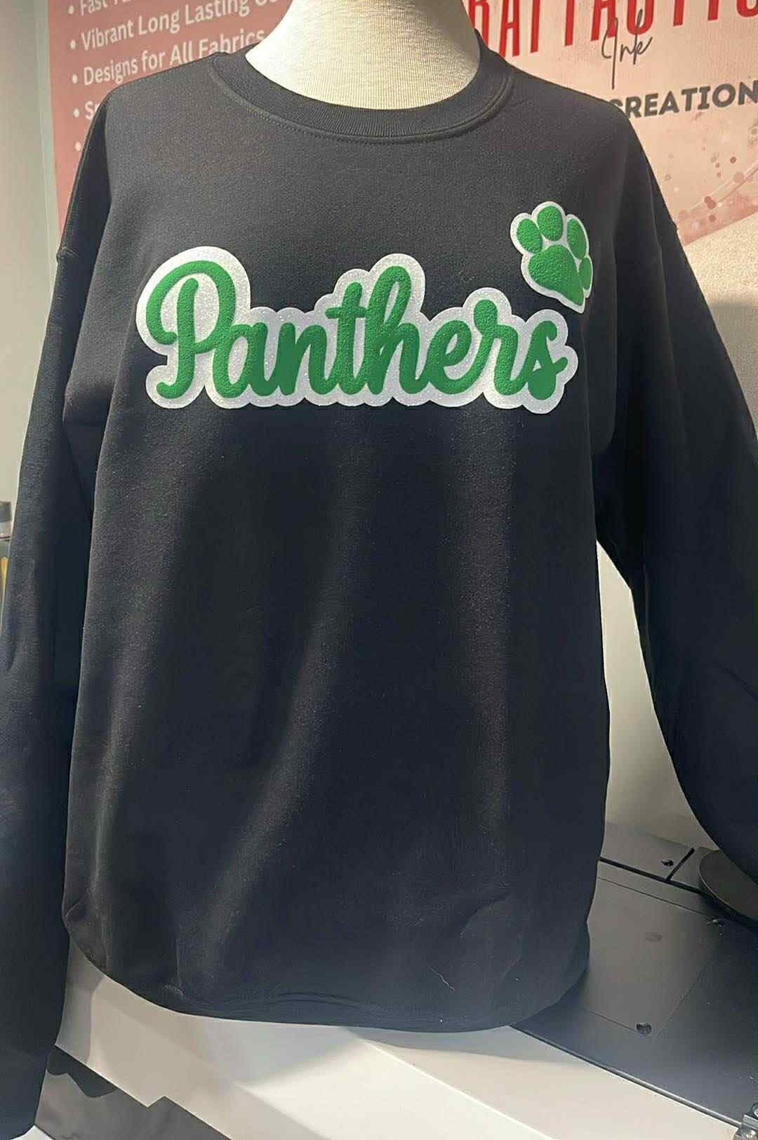 “Palmer Panthers black sweatshirt with green and white puffy vinyl text and paw print — custom school spirit apparel by Craftastic Ink Creations.”