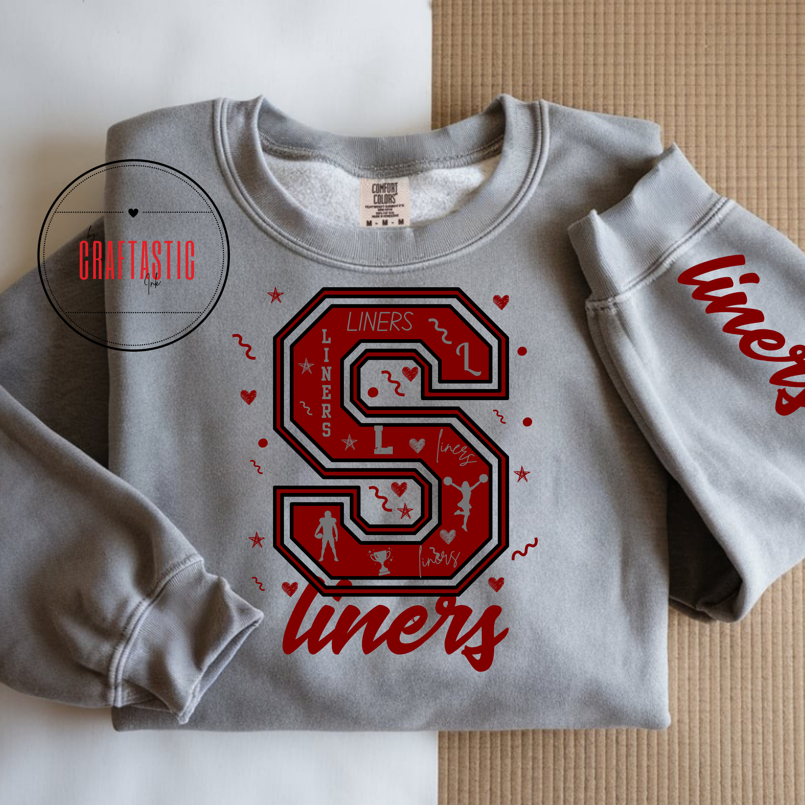 Gray Liners varsity letter “S” sweatshirt with maroon graphics and matching sleeve print.